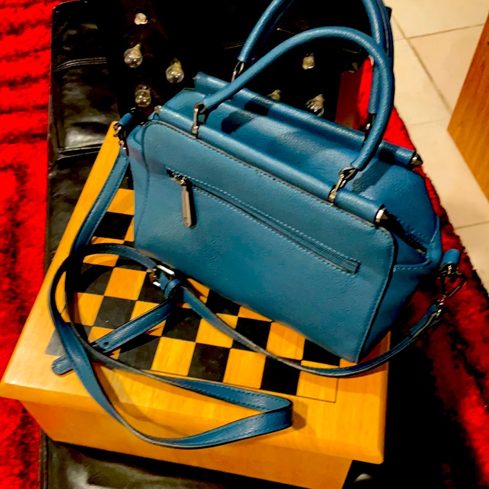Blue leather clutch